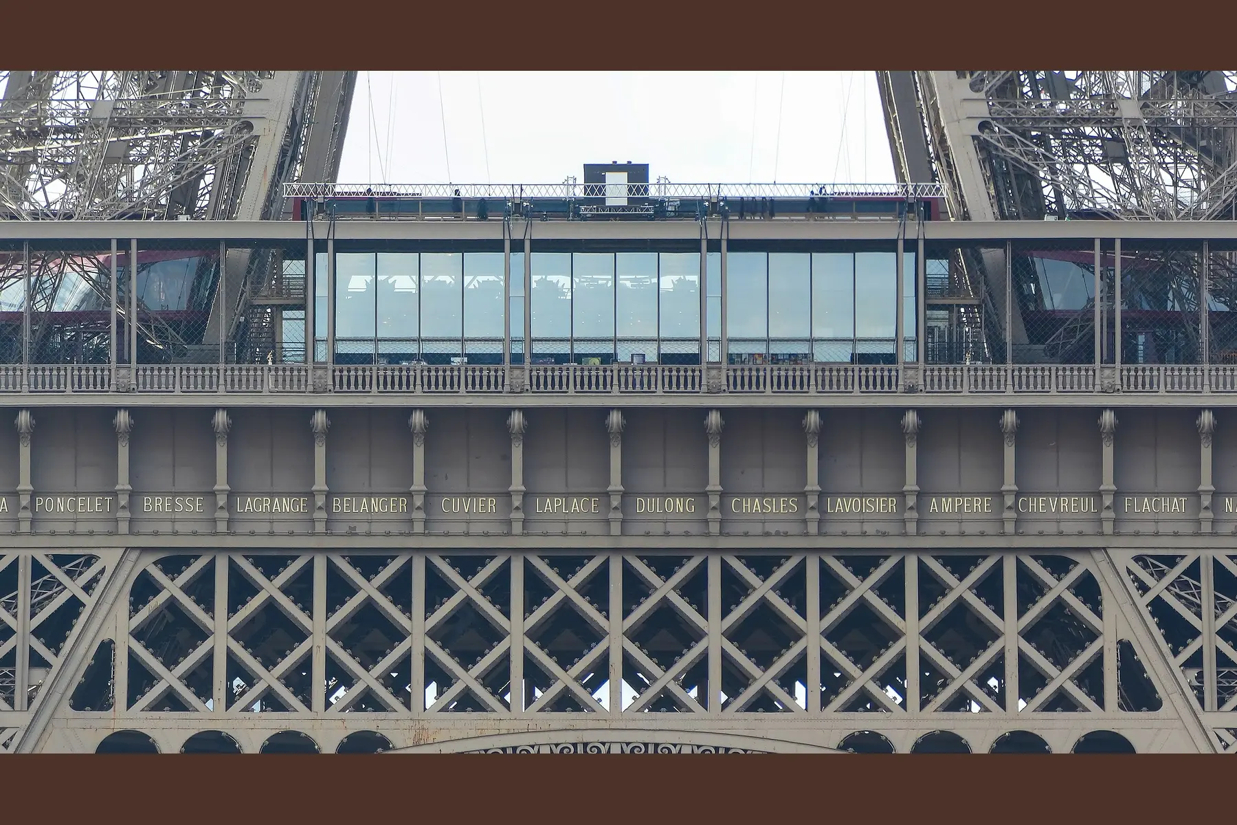 Gilded frieze bearing scientists’ names on the Eiffel Tower’s north facade